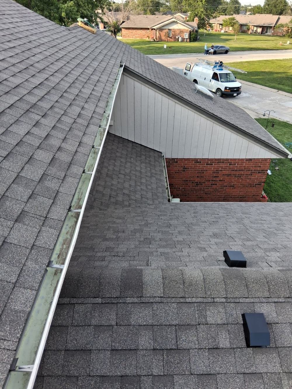 Replaced shingle roof with a new valley on a Kansas City brick home