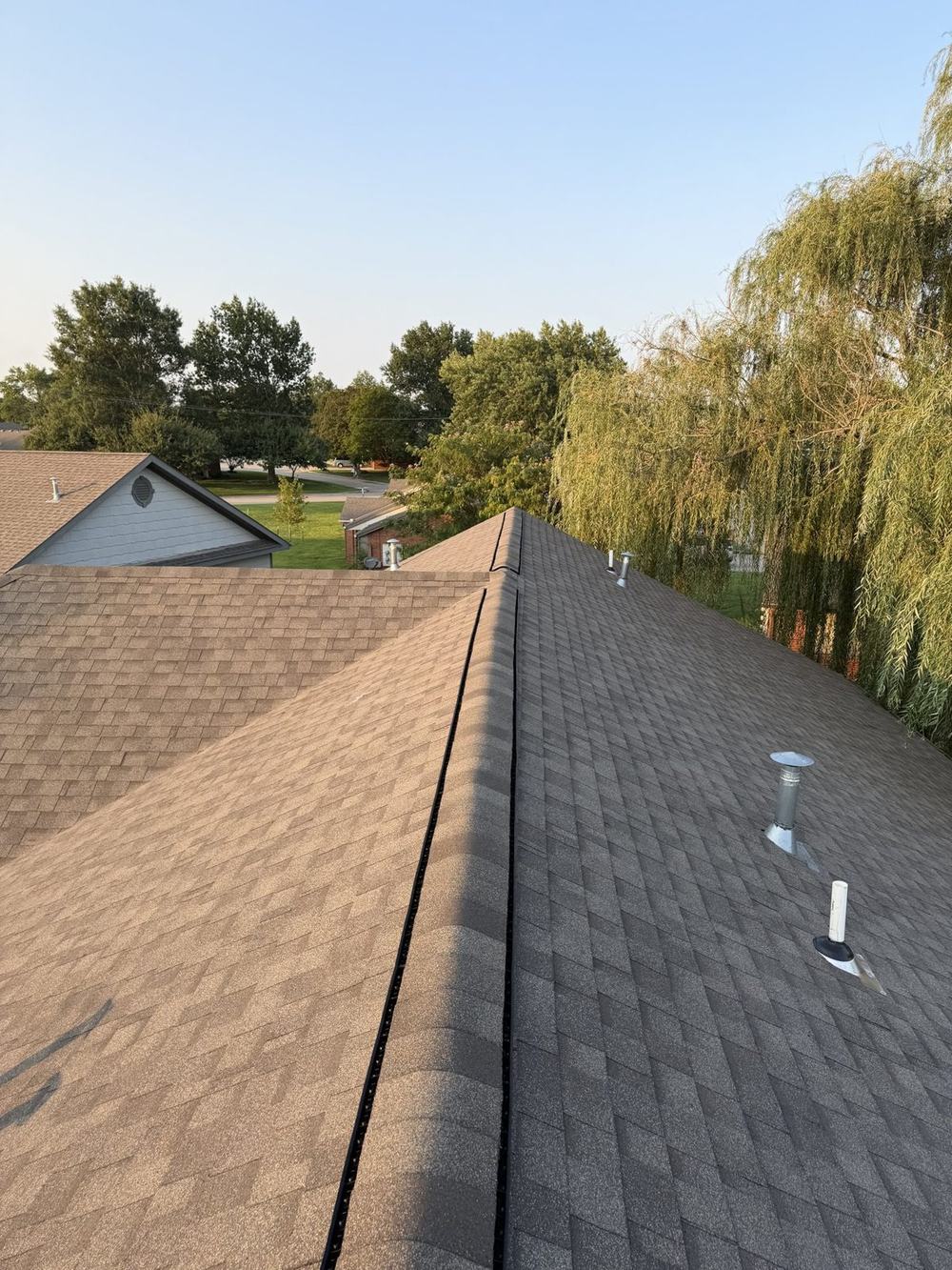 Finished roof with new architectural shingles